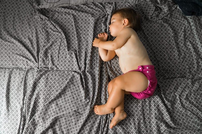 How long can a baby wear a cloth diaper?