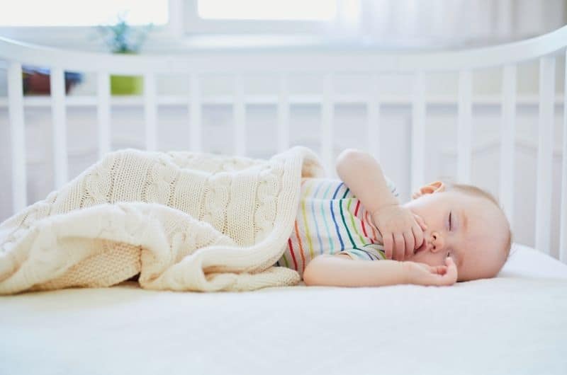 How can I help my baby close his eyes during sleep?