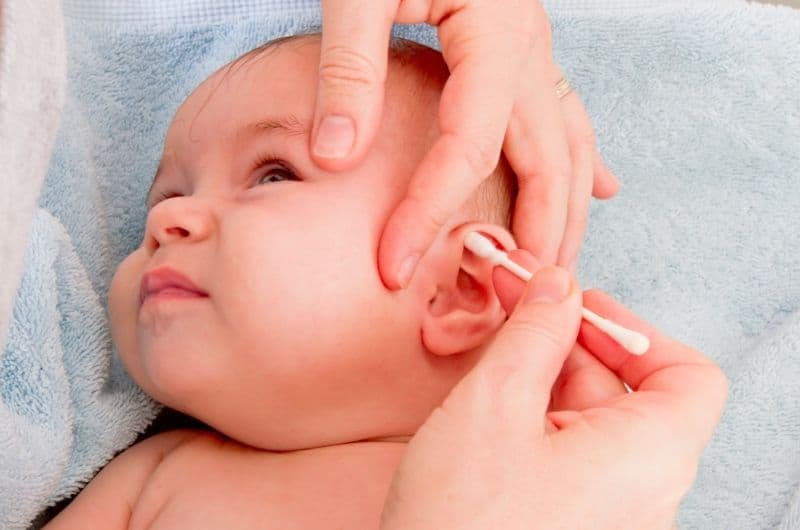 How do you know if your baby has an ear infection or just ear wax buildup?