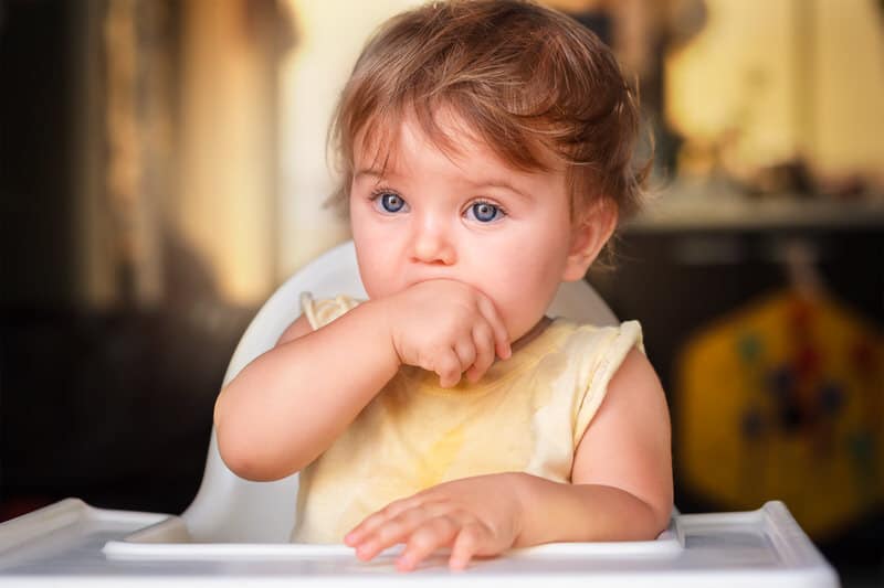 Baby Aggressively Eating Hands And Crying - Why It's Normal But Should Be Avoided