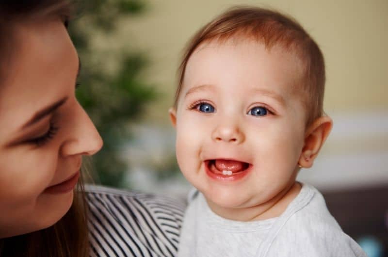 A baby teething could be the cause of smelly poops lately.