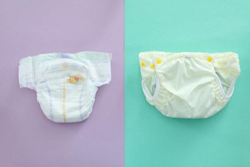 A regular diaper next to a swim diaper for comparison