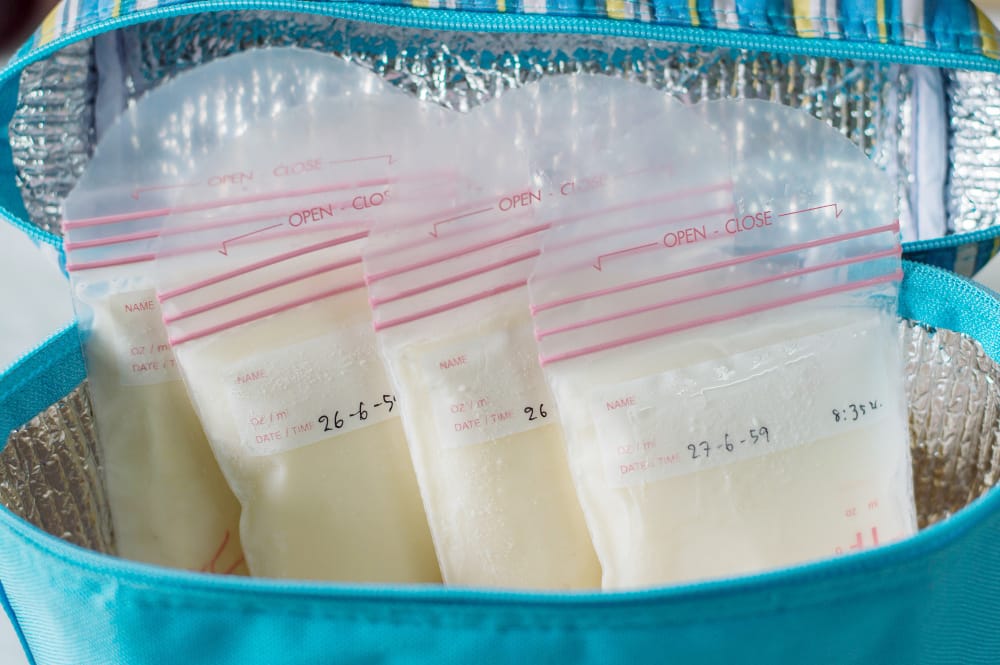 A bag with frozen breast milk for future baby feedings