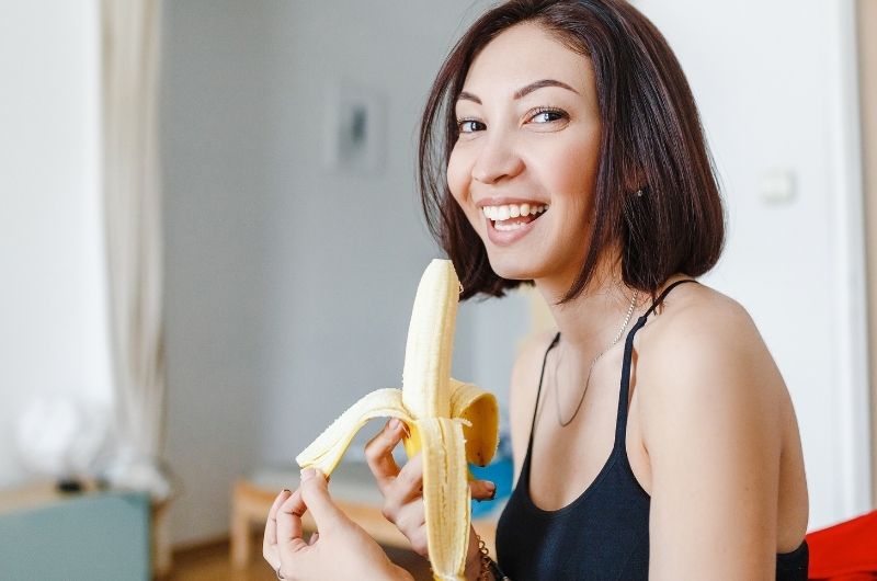 As part of the BRAT diet, a pregnant woman is eating a banana to help her eat food when almost every food makes her nauseous.