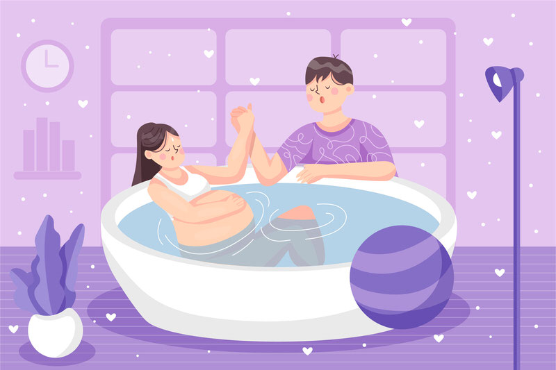 A graphic showing a young pregnant woman having a warm bath to help induce her labor, while her husband holds her hands to comfort her